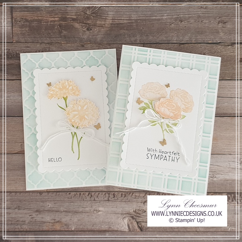 Two cards with a decorative mask background and pretty flowers topper