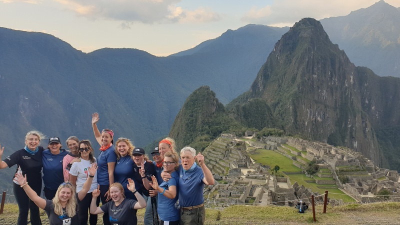 Part of our group standing with Machu Picchu in the background.